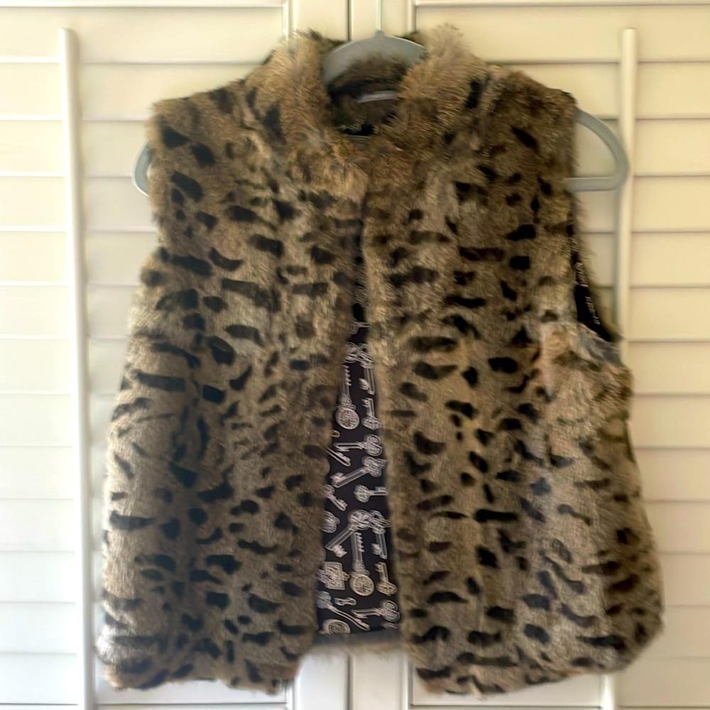 - What Goes Around Comes Around Rabbit Fur Printed Vest.